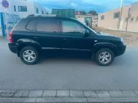 Gebraucht Hyundai Tucson 141 PS (103 kW) 2009 Schwarz SUV