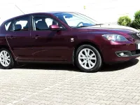 Używany Mazda 3 Active 105 KM (77 kW) 2007 Purpurowy Sedan/Limuzyna