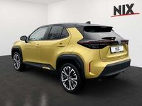 Gebraucht Toyota Yaris Hybrid Elegant 116 PS (85 kW) 2022 Warm gold metallic, dach schwarz