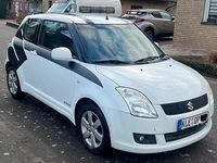 Gebraucht Suzuki Swift 67 PS (49 kW) 2010 Weiß Kleinwagen