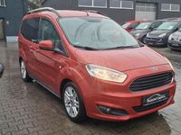 Gebraucht Ford Tourneo Courier Titanium 101 PS (74 kW) 2014 Rot Van / Kleinbus