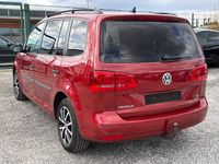 Gebraucht VW Touran Trendline 105 PS (77 kW) 2011 Rot Van / Kleinbus