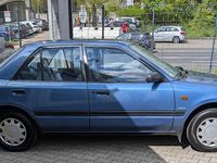 Second-hand Mazda 323 84 CP (61 kW) 1991 Albastru Berlinǎ