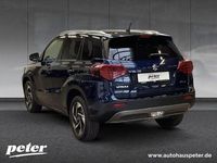 Gebraucht Suzuki Vitara Comfort 102 PS (75 kW) 2025 Sphere blue/ cosmic black pearl SUV
