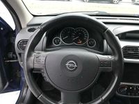Używany Opel Corsa 89 KM (65 kW) 2006 Niebieski Hatchback