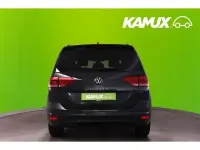 Second-hand VW Touran Highline 150 CP (110 kW) 2023 Gri Monovolum