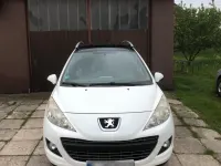 Gebraucht Peugeot 207 90 PS (66 kW) 2011 Weiß Kombi