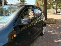 Gebraucht Nissan Pixo 68 PS (50 kW) 2010 Schwarz Kleinwagen