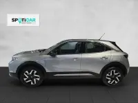 Gebraucht Opel Mokka-e Elegance 100 kW (136 PS) 2024 Kontrast grau (metallic) SUV
