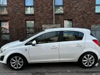 Używany Opel Corsa Active 87 KM (63 kW) 2013 Biały Hatchback