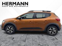 Gebraucht Dacia Sandero Expression 101 PS (74 kW) 2023 Taklamakanorange (orange) Kleinwagen