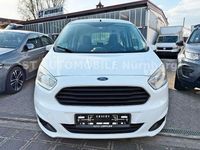 Gebraucht Ford Tourneo Courier Trend 75 PS (55 kW) 2016 Frostweiß Van / Kleinbus