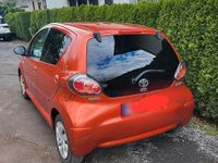 Gebraucht Toyota Aygo 69 PS (50 kW) 2012 Orange Kleinwagen