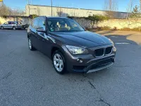 Używany BMW X1 143 KM (105 kW) 2014 Brązowy SUV