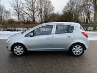 Usado Opel Corsa Edition 80 HP (58 kW) 2009 Prateado Citadino