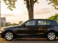 Gebraucht BMW 116 122 PS (89 kW) 2010 Schwarz Kleinwagen