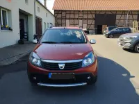 Gebraucht Dacia Sandero 88 PS (64 kW) 2012 Rot Kleinwagen