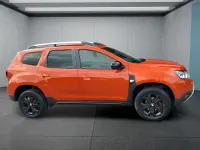 Second-hand Dacia Duster 131 CP (96 kW) 2022 Portocaliu SUV