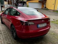 gebraucht Tesla Model 3 Performance Multicoat red / weiß