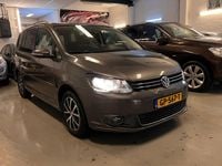 Second-hand VW Touran Highline 105 CP (77 kW) 2013 Gri Monovolum