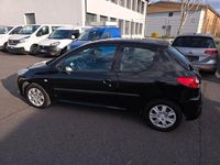 Gebraucht Peugeot 206 73 PS (53 kW) 2011 Schwarz Limousine