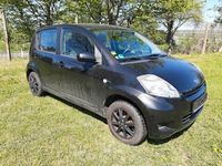 Gebraucht Daihatsu Sirion 69 PS (50 kW) 2011 Schwarz Kleinwagen