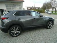 Gebraucht Mazda CX-30 186 PS (136 kW) 2023 Machine grey metallic (grau) SUV