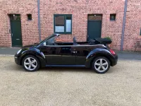 Gebraucht VW New Beetle 102 PS (75 kW) 2010 Schwarz Kleinwagen