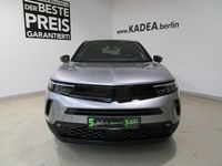 Gebraucht Opel Mokka 131 PS (96 kW) 2023 Kontrast grau/quarz silber SUV