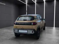 Używany Dacia Spring Extreme 47 kW (65 KM) 2024 Beżowy Hatchback