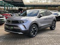 Gebraucht Opel Mokka-e Ultimate 100 kW (136 PS) 2022 Kontrast grau (metallic) SUV