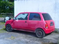 Gebraucht Daihatsu Cuore 56 PS (41 kW) 1998 Rot Kleinwagen