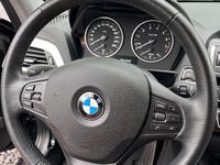 Używany BMW 116 109 KM (80 kW) 2016 Czarny Hatchback