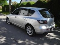 Second-hand Mazda 3 Inclusive 105 CP (77 kW) 2009 Argintiu Berlinǎ