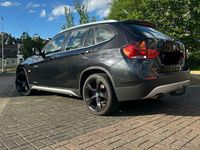 Second-hand BMW X1 204 CP (150 kW) 2009 Negru SUV