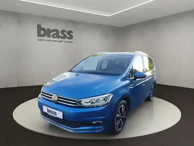 Używany VW Touran Highline 150 KM (110 kW) 2022 Niebieski Minivan