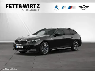 Gebraucht BMW i5 M Sport 442 kW (601 PS) 2024 Saphirschwarz metallic Kombi