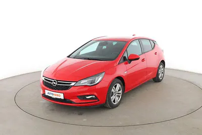 Używany Opel Astra Active 125 KM (91 kW) 2016 Czerwony Sedan/Limuzyna