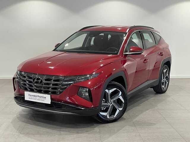 Sunset red Usado 2024 Hyundai Tucson SUV | 35.500 € (Caro) - Imagen 1/4