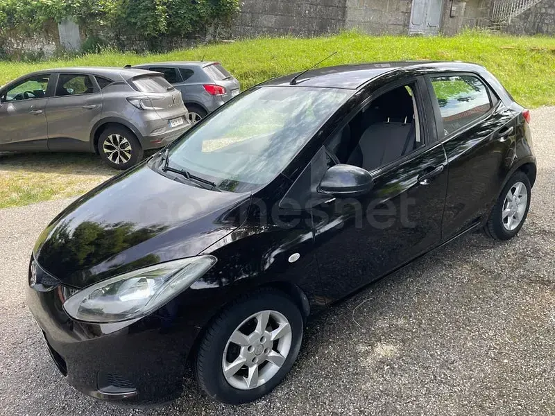 Usado Mazda 2 Active 68 CV (50 kW) 2008 Granate Utilitario