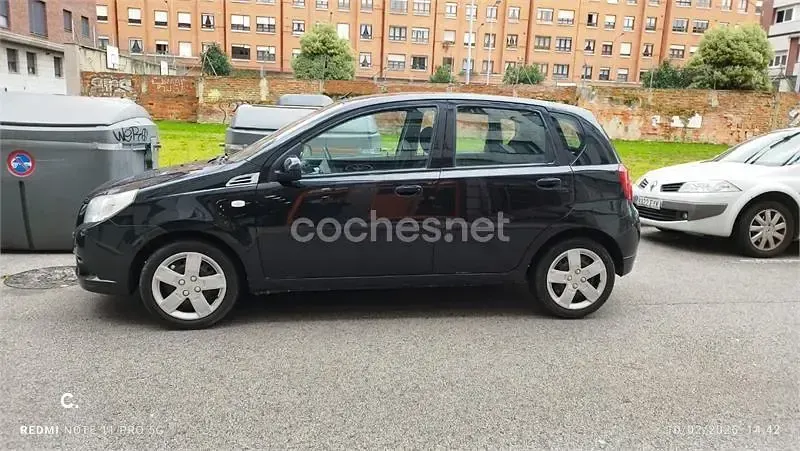 Usado Chevrolet Aveo LS 84 CV (61 kW) 2010 Negro Berlina