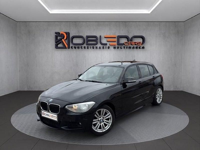 Usado BMW 118 Sport Line 143 CV (105 kW) 2012 Negro Utilitario