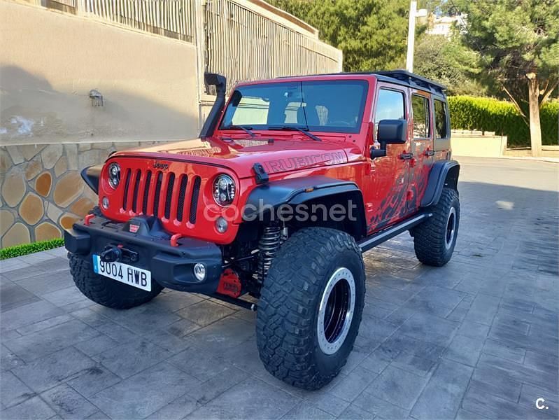 Rojo Usado 2014 Jeep Wrangler Unlimited Rubicon SUV | 59.950 € - Imagen 1/4