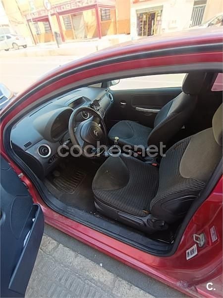 Usado Citroën C2 70 CV (51 kW) 2007 Rojo Utilitario