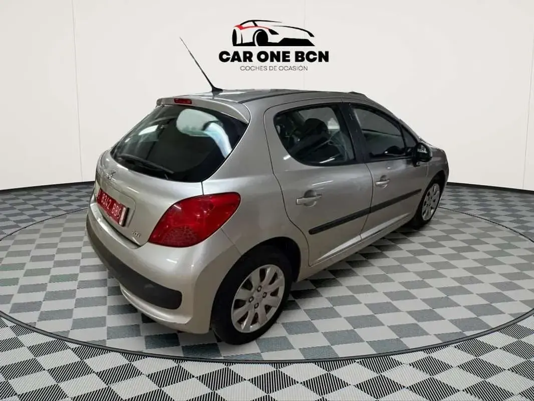 Usado Peugeot 207 69 CV (50 kW) 2009 Gris Utilitario