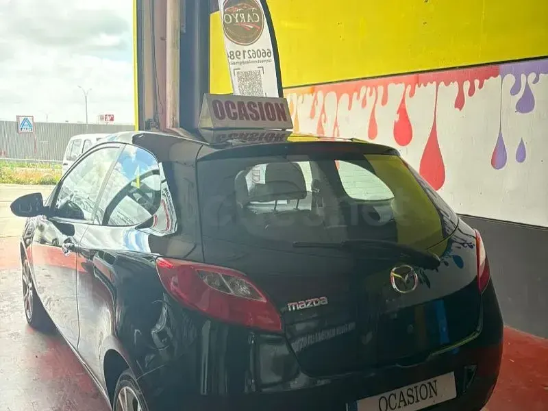 Usado Mazda 2 Active 75 CV (55 kW) 2009 Negro Utilitario