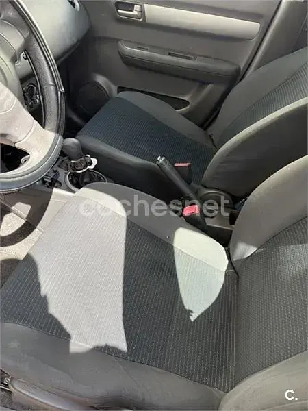 Usado Suzuki Swift GLX 92 CV (67 kW) 2009 Gris / plata Utilitario