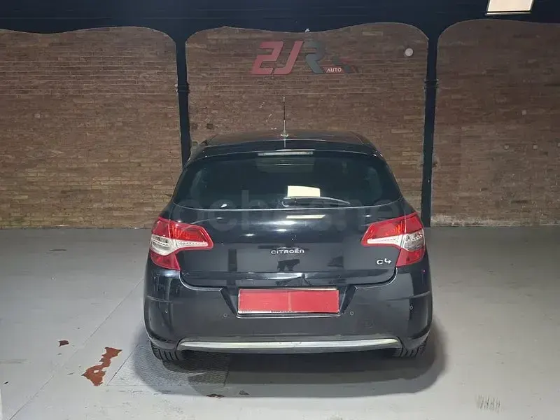 Usado Citroën C4 114 CV (83 kW) 2013 Negro Berlina