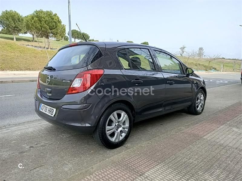 Usado Opel Corsa Selective 75 CV (55 kW) 2013 Marrón Utilitario