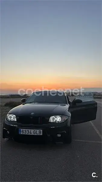 Usado BMW 118 Sport Line 143 CV (105 kW) 2009 Negro Utilitario